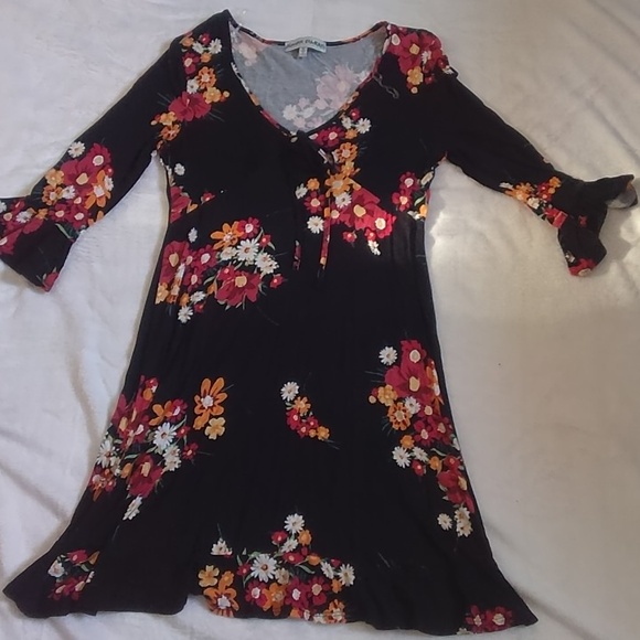 Almost Famous Dresses & Skirts - Black dress with tropical color flowers quarter ruffle sleeves